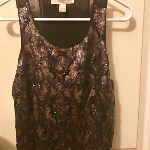 Purple/gold sequin top w/ sheer slit back.